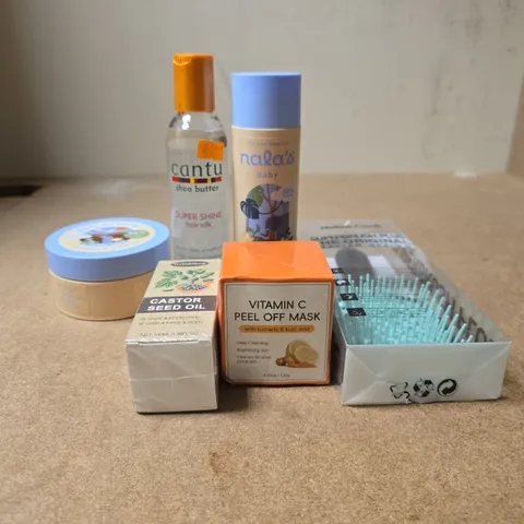 TOTE OF APPROXIMATELY 20 ASSORTED COSMETIC ITEMS TO INCLUDE CASTOR SEED OIL, VITAMIN C PEEL OFF MASK, HOLLOW COMB SUPER BRUSH, VANILLA CLOUD BODY BUTTER ETC