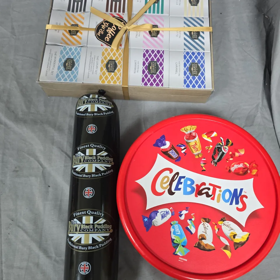 LARGE QUANTITY OF ASSORTED FOOD ITEMS TO INCLUDE CELEBRATIONS, BLACK PUDDING, TOMATOE SAUCE AND COFFEE SET