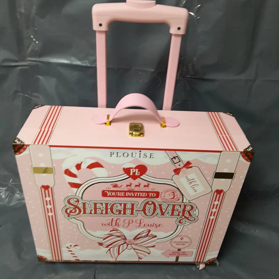 PLOUISE SLEIGH-OVER SUITCASE IN PINK