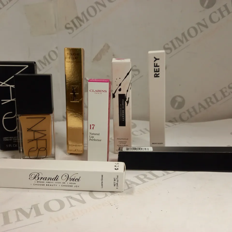 LOT OF APPROXIMATELY 7 MAKEUP ITEMS TO INCLUDE YSL , NARS , FENTY BEAUTY ECT 