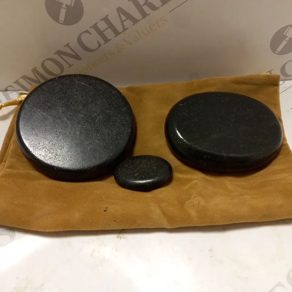 BOX OF APPROXIMATELY 25 STONES FOR HOT STONE MASSAGE