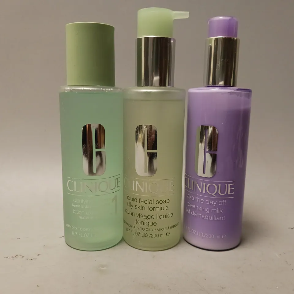 3 CLINIQUE BEAUTY PRODUCTS TO INCLUDE CLARIFYING LOTION-1, LIQUID FACIAL SOAP, TAKE THE DAY OFF CLEANSING MILK