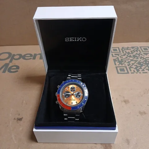 SEIKO CHRONOGRAPH WATCH WITH ORANGE DIAL & BLUE BEZEL, STAINLESS STEEL BRACELET – BOXED 