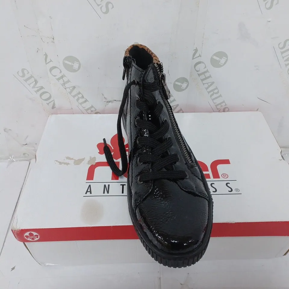 BOXED PAIR OF RIEKER HI TOP TRAINERS IN BLACK SIZE 6