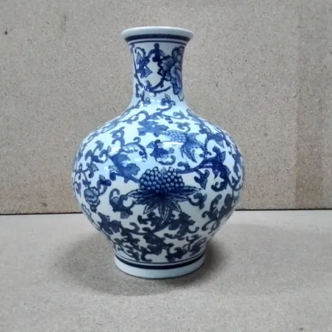 ORNATELY DECORATED VASE
