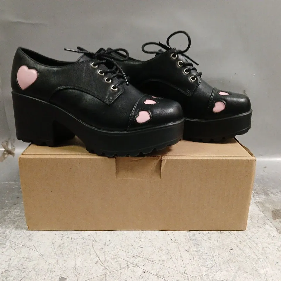 BOXED PAIR OF KOI TENNIN HEART SHOES IN BLACK W. PINK HEARTS SIZE UK 5