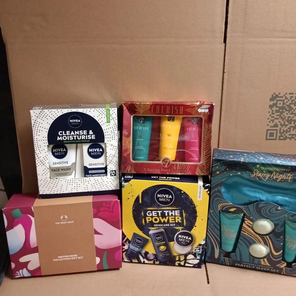 LOT OF 5 ASSORTED BATH AND BODY GIFT SETS TO INCLUDE THE BODY SHOP, NIVEA MAN AND THE INDULGENT BATHING CO