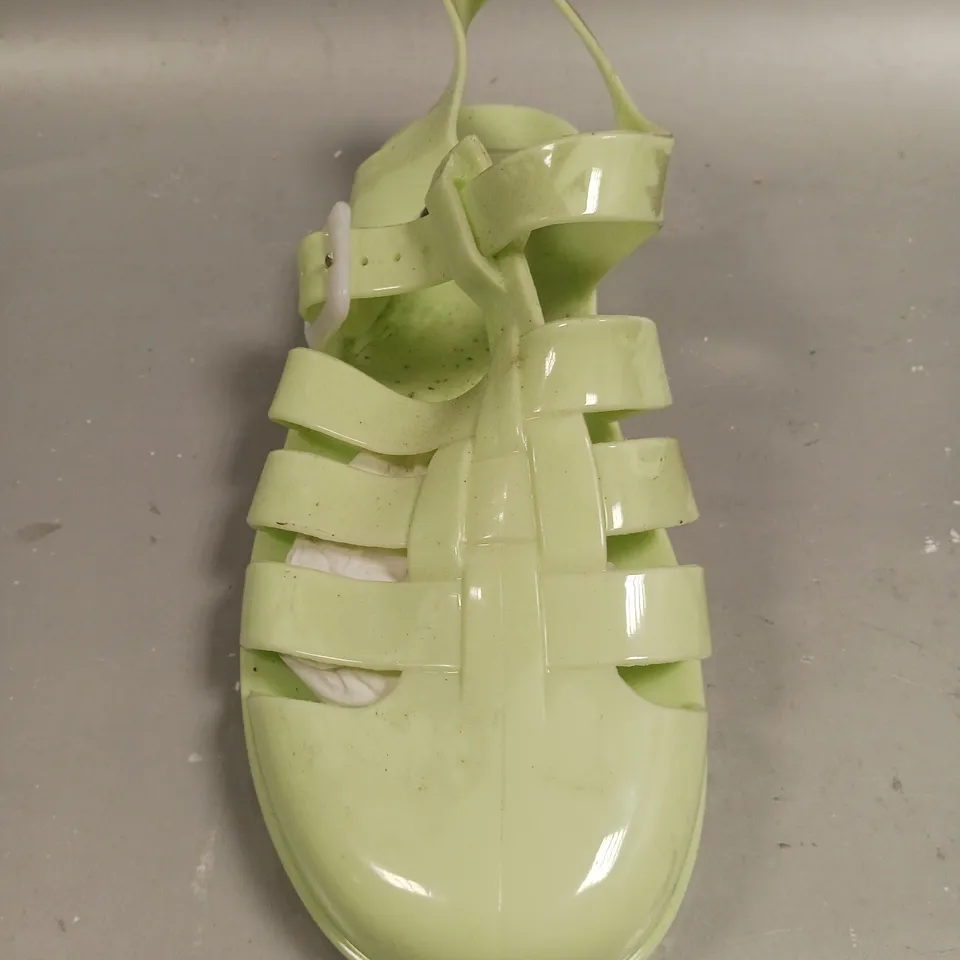 LOT OF APPROXIMATELY 12 PAIRS OF LINZI GREEN PLASTIC SANDALS - VARIOUS SIZES