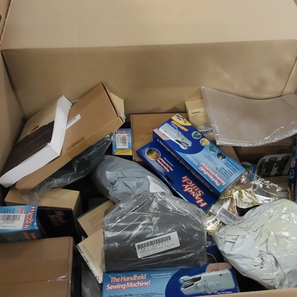 PALLET OF ASSORTED ITEMS INCLUDING: GLUE GUN, HANDHELD SEWING MACHINE, PHONE MOUNT, FLEECE BLANKET, BIKINIS, HOUSE MAT, STAR WARS STATIONARY KIT, NUTCRACKER, CHRISTMAS HATS
