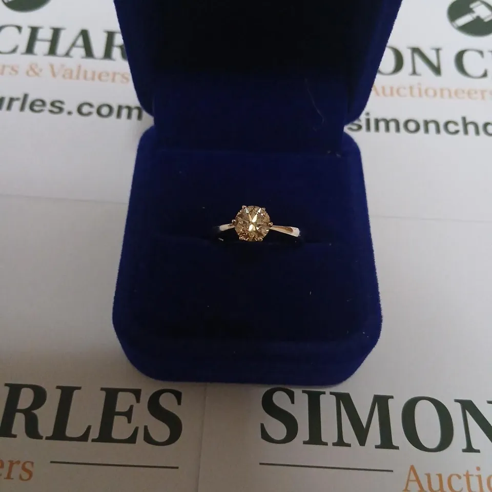 18CT WHITE GOLD SOLITAIRE RING SET WITH A NATURAL DIAMOND WEIGHING +1.14CT