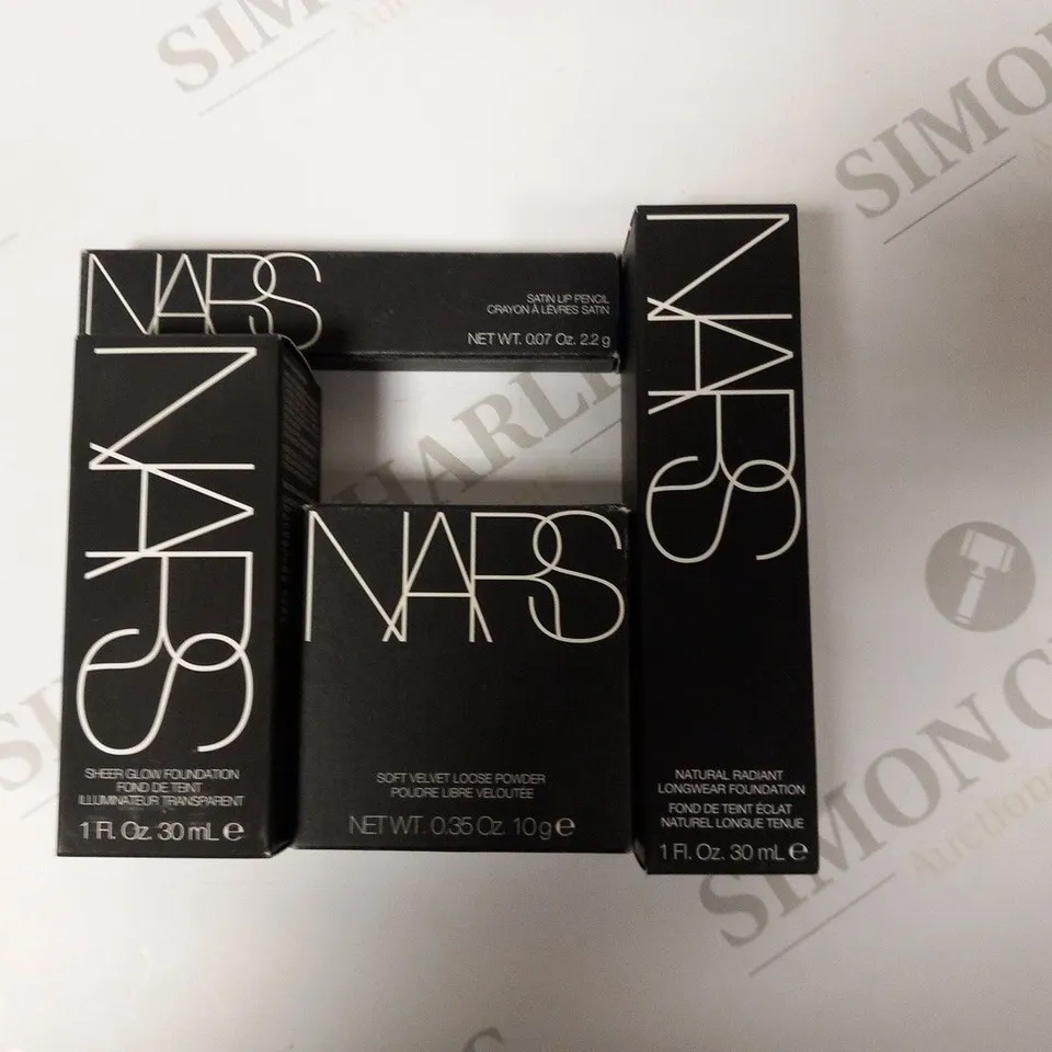 APPROXIMATELY 91 ASSORTED NARS COSMETICS TO INCLUDE; SHEER GLOW FOUNDATION, NATURAL RADIANT LONGWEAR FOUNDATION, SOFT VELVET LOOSE POWDER AND SATIN LIP PENCIL