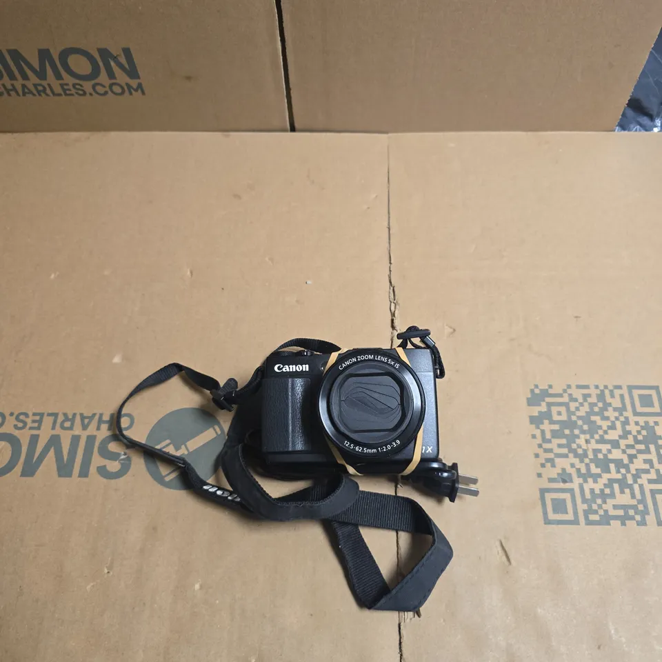 CANON DIGITAL CAMERA WITH 5X ZOOM LENS (12.5-62.5MM) – WITH STRAP AND BATTERY CHARGER 