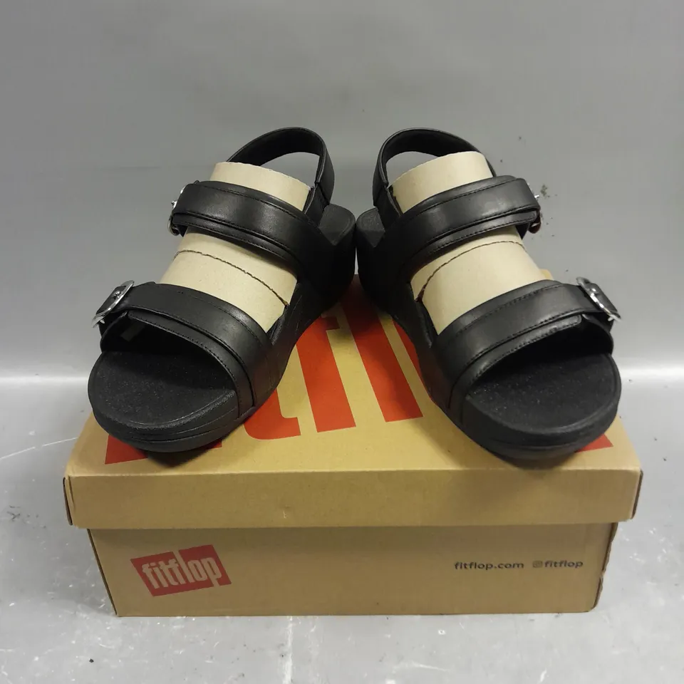 BOXED PAIR OF FITFLOP LULU ADJUSTABLE LEATHER BLACK-STRAP SANDALS - 4.5