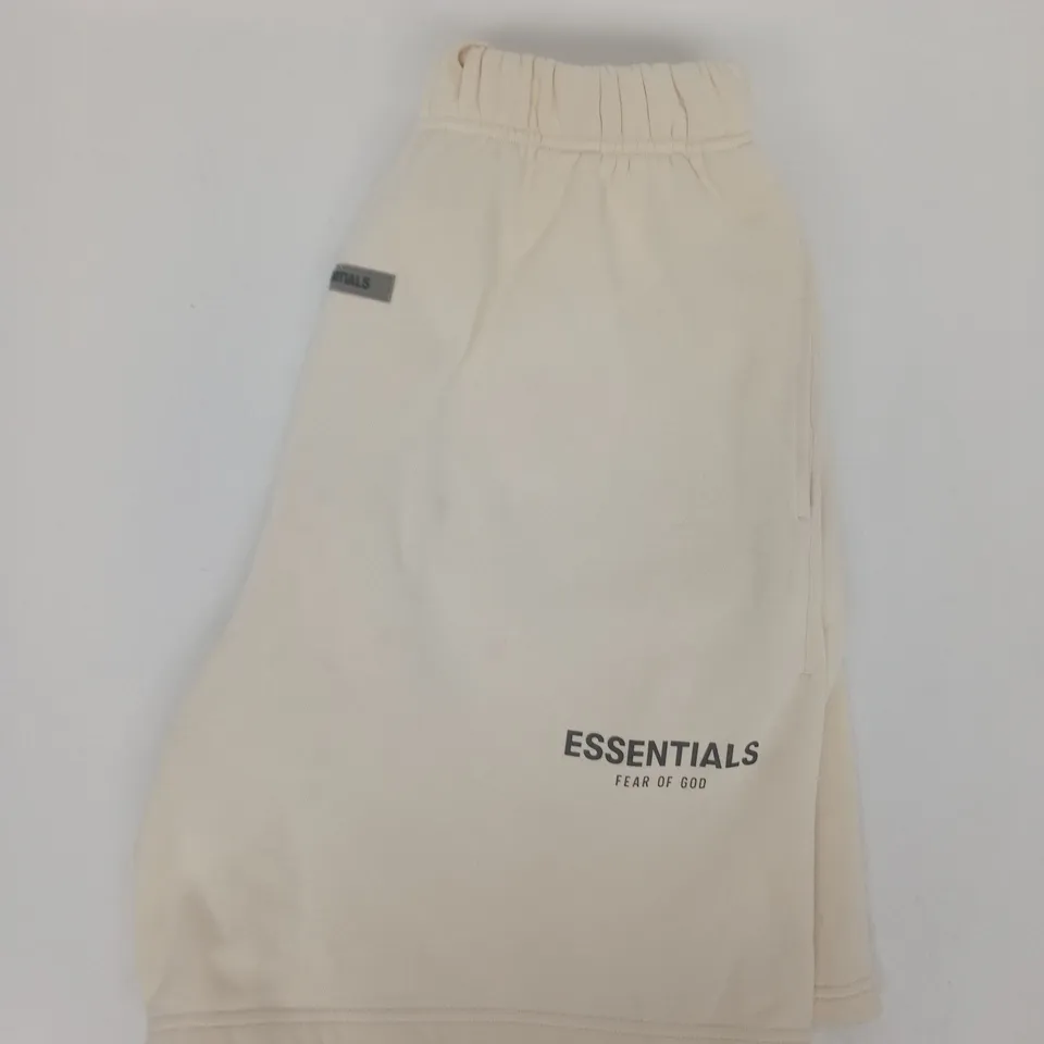 ESSENTIALS FEAR OF GOD SWEAT SHORTS IN CREAM SIZE MEDIUM