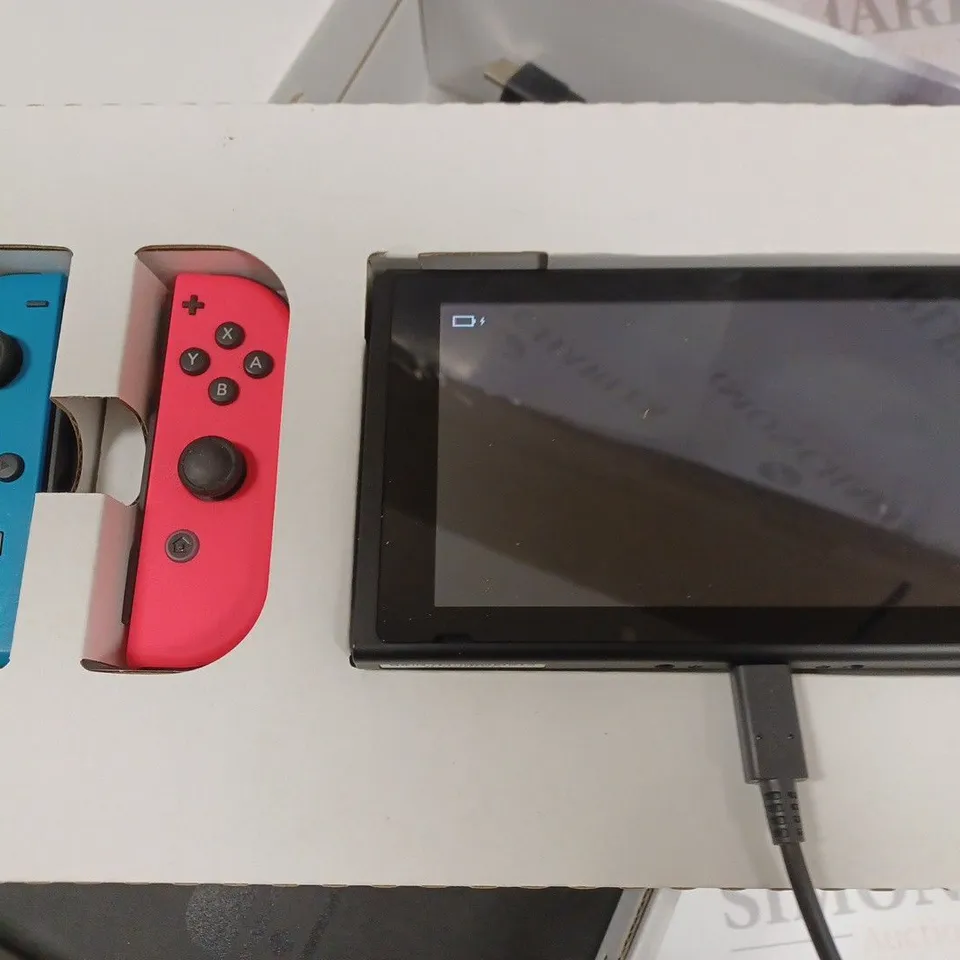BOXED NINTENDO SWITCH WITH CONTROLLERS AND ACCESSORIES