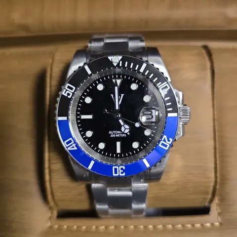 WILLIAM JOURDAIN ALL STAINLESS STEEL GENTS WATCH WITH BLACK DIAL AND WOODEN BOX
