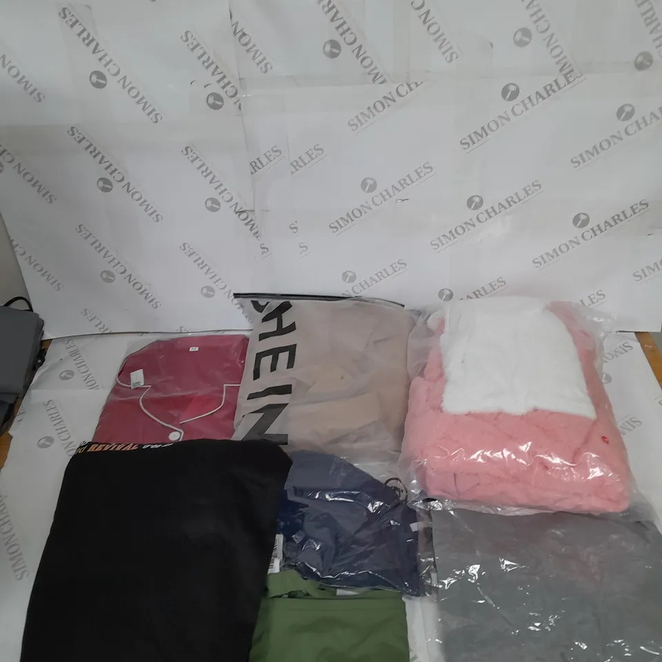 LARGE BOX OF ASSORTED CLOTHING ITEMS IN VARIOUS COLOURS AND SIZES INCLUDING TROUSERS , TOPS AND JUMPERS 