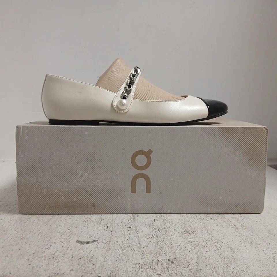 BOXED PAIR OF NINE WEST WOMEN'S LEATHER MARY JANE SHOES IN BEIGE/CREAM WITH BLACK TOE CAP