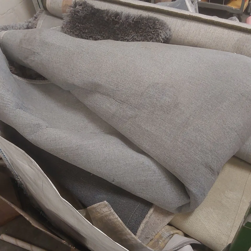 STILLAGE CONTAINING A VERY LARGE QUANTITY OF ASSORTED DESIGNER RUGS // STILLAGE NOT INCLUDED