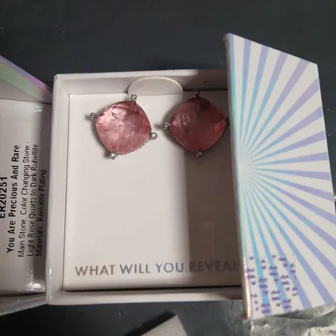 BOMB PARTY YOU ARE PRECIOUS AND RARE COLOUR-CHANGING STONE EARRINGS – LIGHT ROSE QUARTZ TO DARK RUBELLITE, HEMATITE PLATING (ER20251)