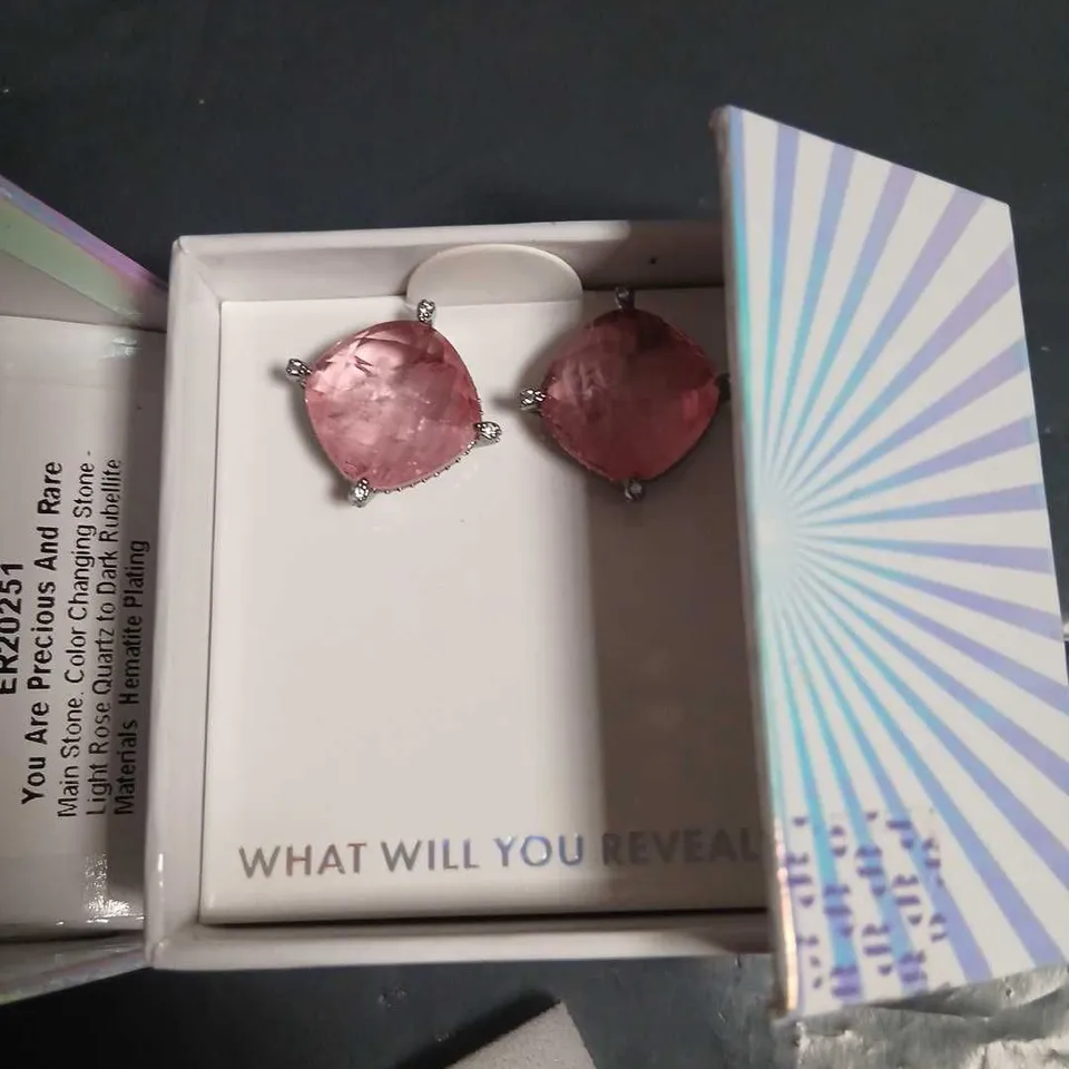 BOMB PARTY YOU ARE PRECIOUS AND RARE COLOUR-CHANGING STONE EARRINGS – LIGHT ROSE QUARTZ TO DARK RUBELLITE, HEMATITE PLATING (ER20251)