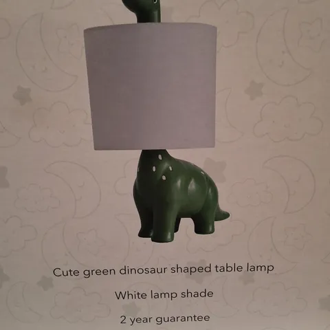 BOXED GREEN DINOSAUR-SHAPED TABLE LAMP WITH WHITE SHADE