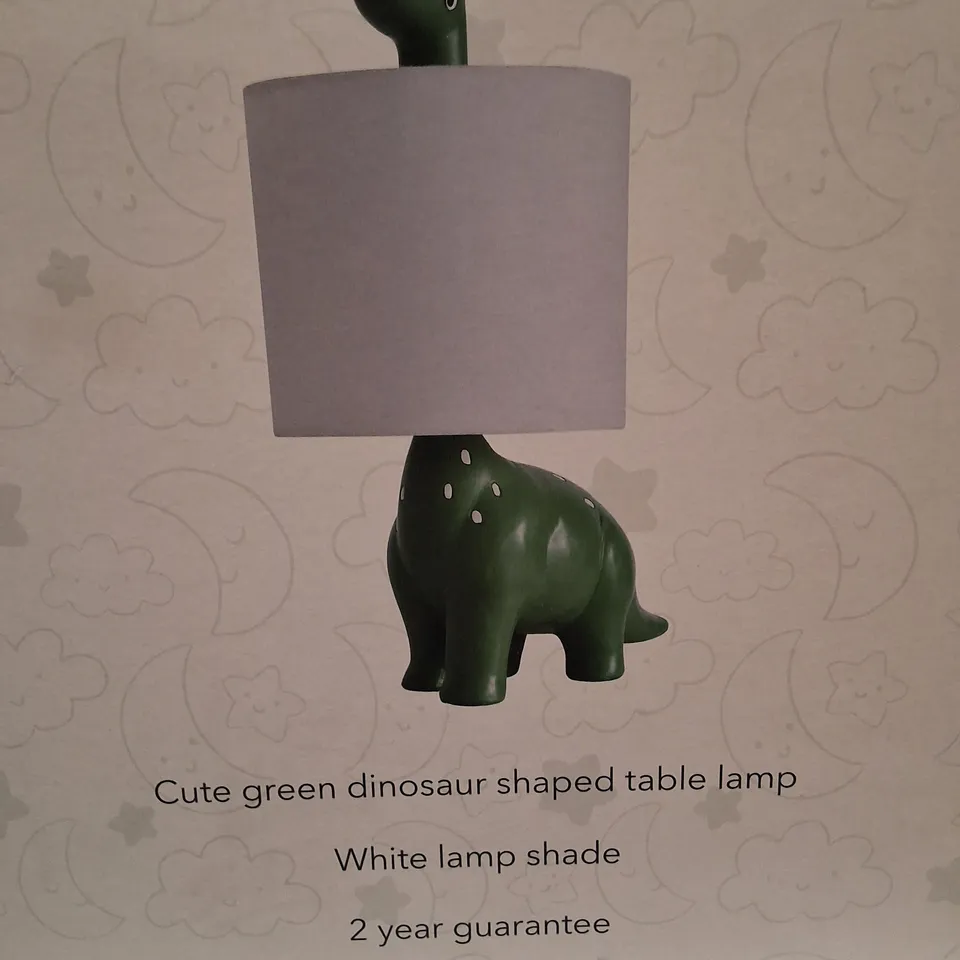 BOXED GREEN DINOSAUR-SHAPED TABLE LAMP WITH WHITE SHADE