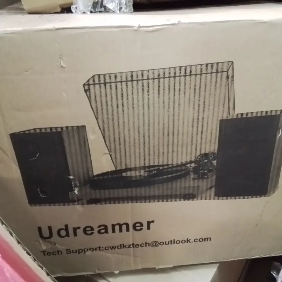 PALLET CONTAINING VARIOUS ASSORTED BOXED HOUSEHOLD ITEMS TO INCLUDE: TURNTABLE SYSTEM, CHILDREN'S BACK PACK, FILING CABINET AND LOTS MORE UNMARKED BOXED ITEMS 
