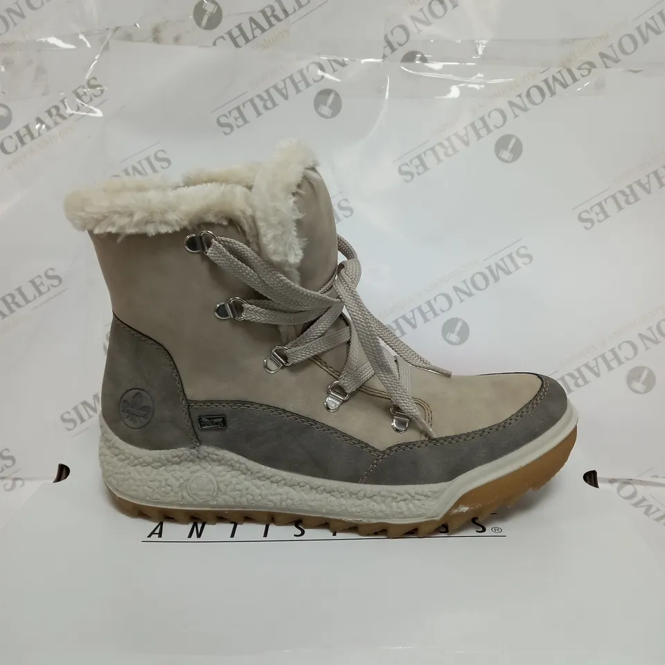 BOXED PAIR OF RIEKER ANTISTRESS WATER RESISTANT WARM HIKING BOOTS, CREAM - SIZE 6.5 