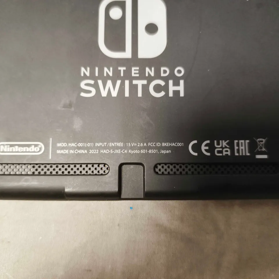 NINTENDO SWITCH CONSOLE (HAC-001) WITH NEON BLUE/NEON RED JOY-CONS