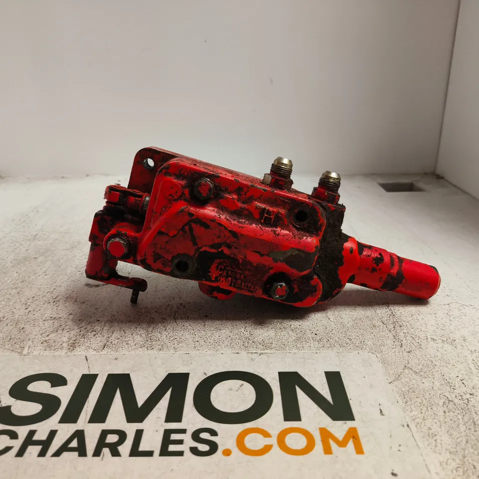 RED CAST-METAL HYDRAULIC CONTROL VALVE ASSEMBLY