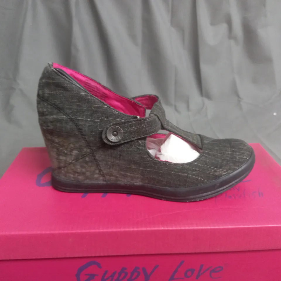 BOX OF APPROXIMATELY 10 BLACK  GUPPY LOVE BY BLOWFISH SHOES IN VARIOUS SIZES 