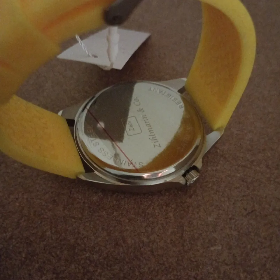 ZIHLMANN & CO STAINLESS STEEL WATCH WITH YELLOW FACE & YELLOW RUBBER STRAP