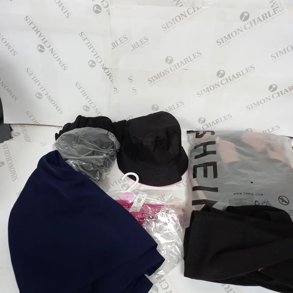 LARGE BOX OF ASSORTED CLOTHING ITEMS IN VARIOUS COLOURS AND SIZES INCLUDING TROUSERS , TOPS AND JUMPERS 
