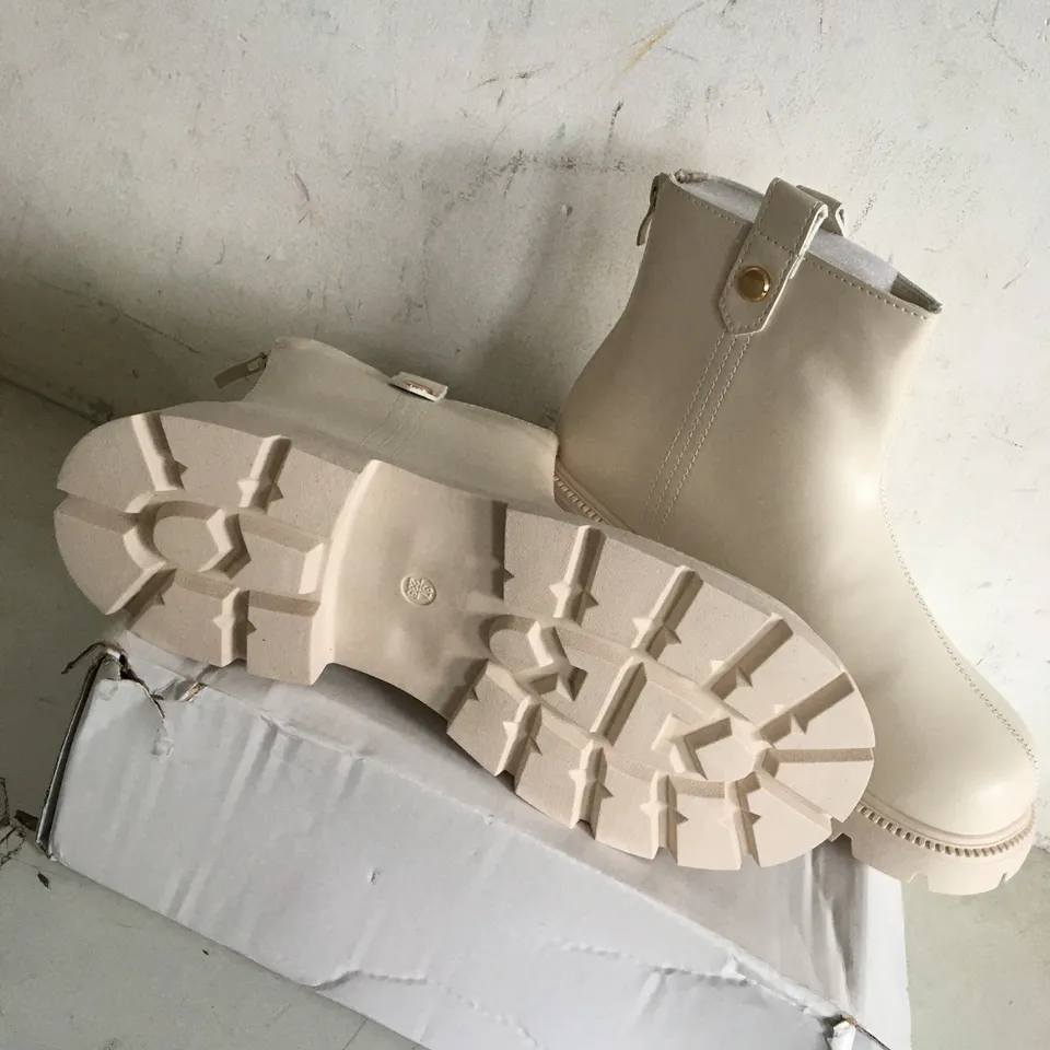 BOXED PAIR OF SIZE 37 CREAM FAUX LEATHER BOOTS