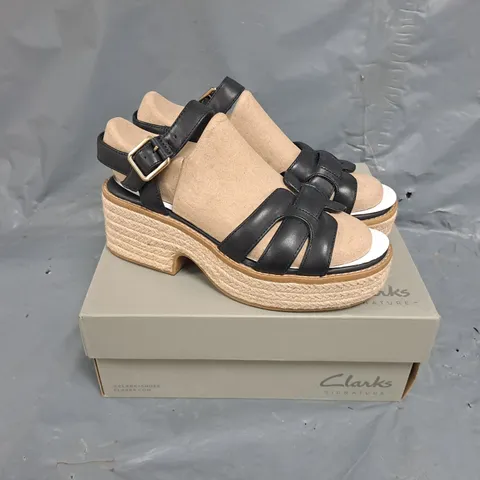 BOXED PAIR OF CLARKS STRAP SANDALS IN BLACK - SIZE 5