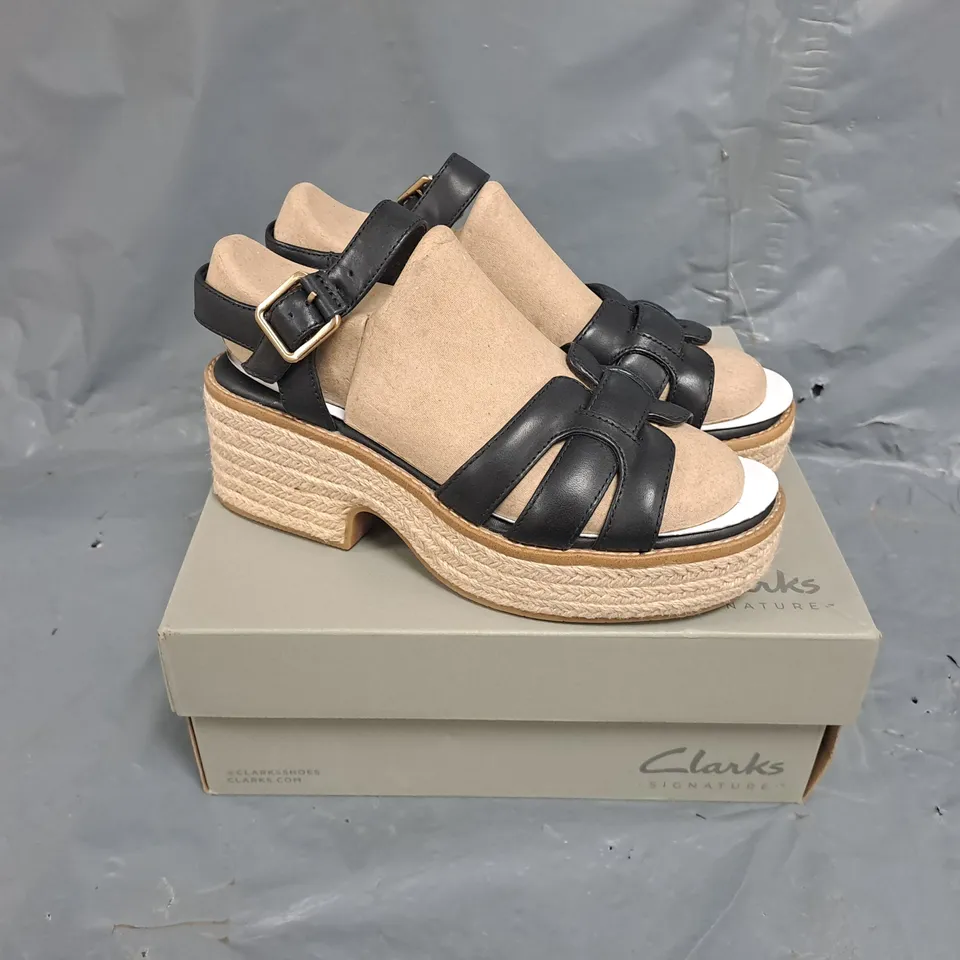 BOXED PAIR OF CLARKS STRAP SANDALS IN BLACK - SIZE 5