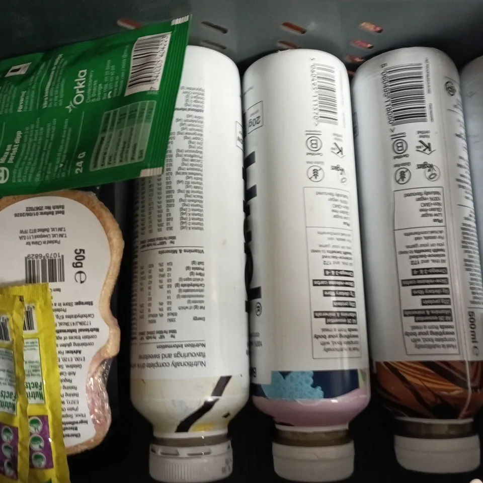 APPROXIMATELY 10 ASSORTED FOOD AND DRINK ITEMS TO INCLUDE HUEL, RED BULL, ETC, ETC