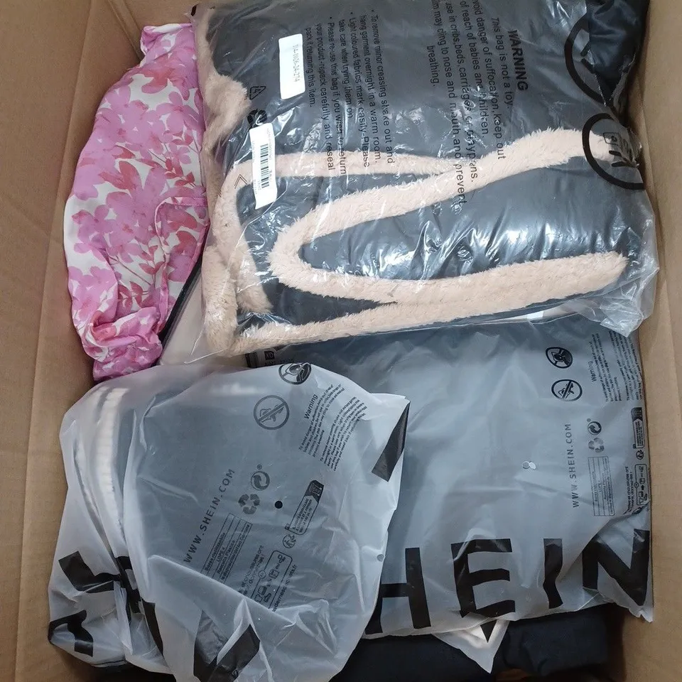 LARGE BOX OF ASSORTED CLOTHING ITEMS IN VARIOUS COLOURS AND SIZES INCLUDING TROUSERS , TOPS AND JUMPERS 