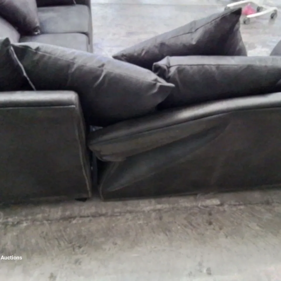 DESIGNER LEATHER LOOK FABRIC UPHOLSTERED CORNER SOFA IN BLACK HEAVILY DAMAGED AT REAR OF FRAME