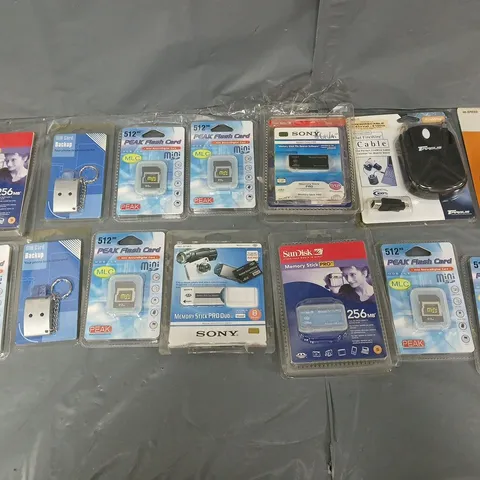 APPROXIMATELY 50 PACKAGED ELECTRICAL GOODS TO INCLUDE PEAK FLASH CARDS, MEMORY STICKS, AND SIM CARD BACK UPS ETC.