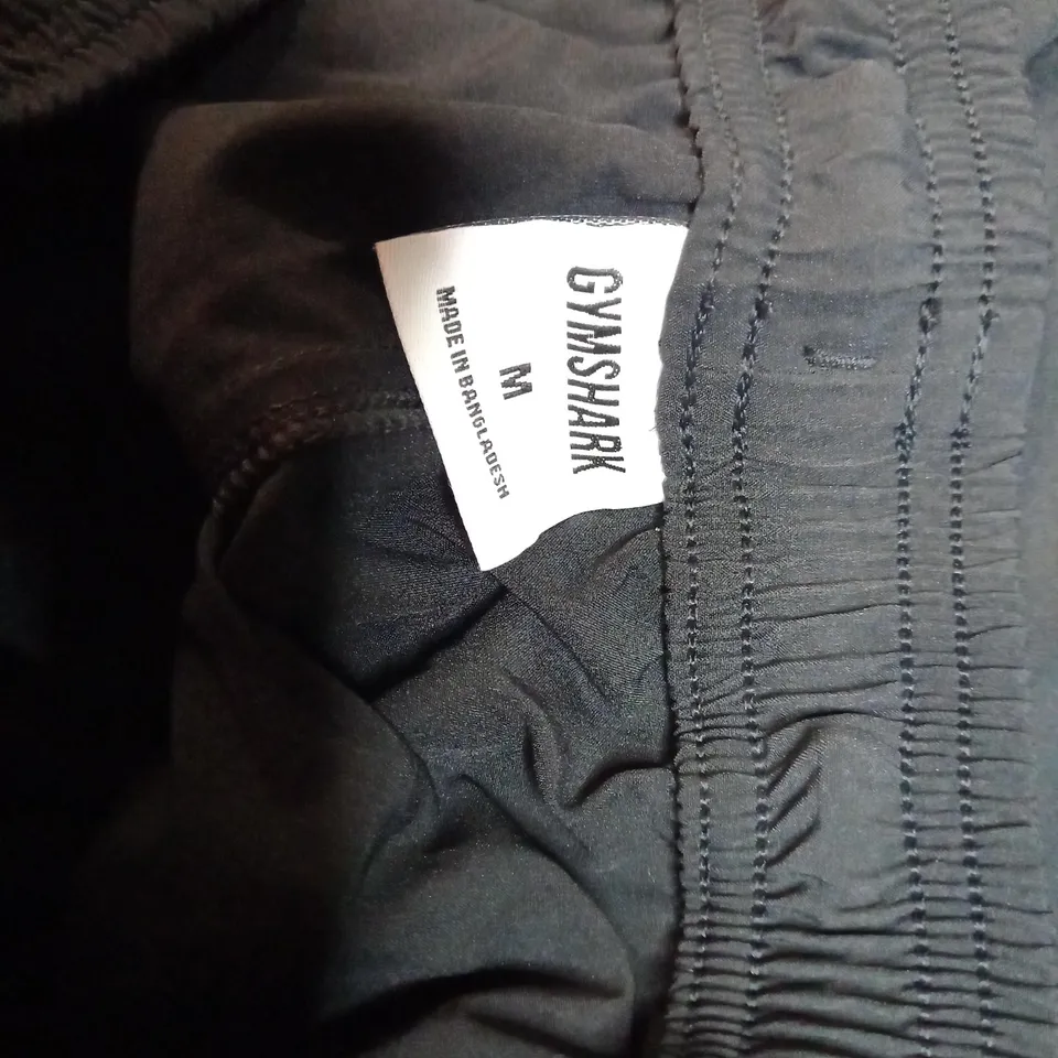 GYMSHARK BLACK/LOGO LIGHT WEIGHT TRACK BOTTOMS - MEDIUM