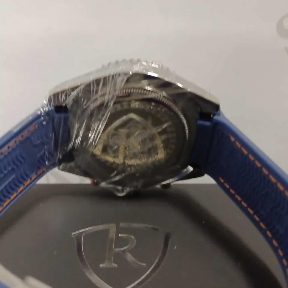 MEN’S RUCKSTUHL CHRONOGRAPH R400 WATCH – SILVER COLOUR CASE – SILVER DIAL – 3ATM WATER RESISTANT – BLUE RUBBER STRAP 