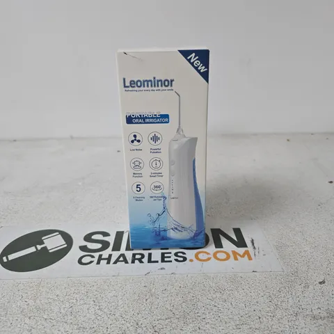 LEOMINOR PORTABLE ORAL IRRIGATOR