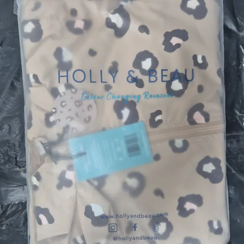 BOX OF 4 HOLLY & BEAU COLOUR CHANGING RAINCOATS IN ANIMAL PRINT AGE SIZES 5-6