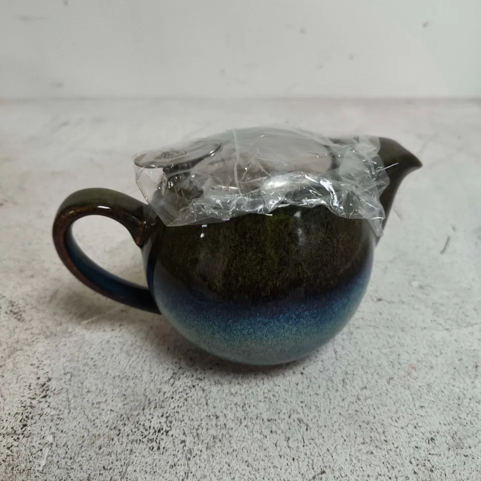 'SAARA' LIGHT GREEN CERAMIC TEAPOT WITH REACTIVE GLAZE 