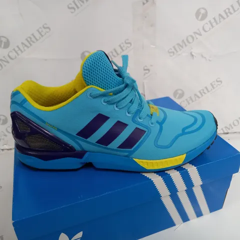 BOXED PAIR OF ADIDAS TORSION BLUE TRAINERS SIZE 9