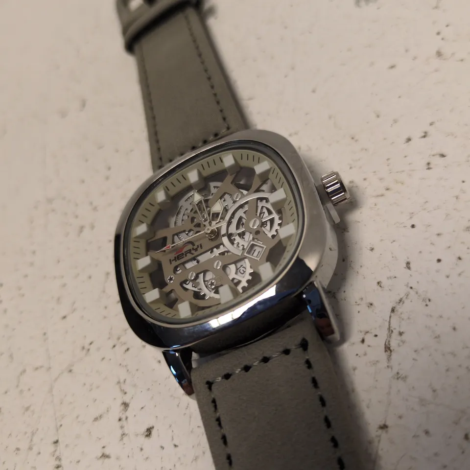 HERRYI SKELETON DIAL STAINLESS STEEL WRISTWATCH – GREY LEATHER STRAP