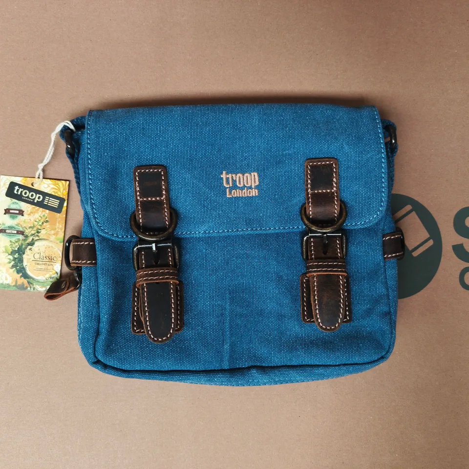 TROOP LONDON BLUE CANVAS CROSSBODY BAG IN BLUE