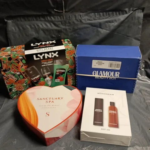 BOX OF APPROXIMATELY 15 ASSORTED BATH AND BODY GIFT SETS TO INCLUDE LYNX, SANCTUARY SPA AND MONOGRAM